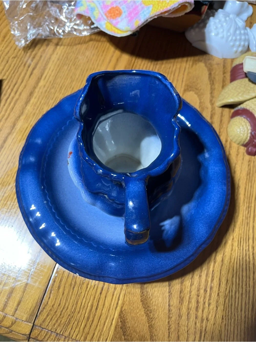 Blue Ceramic Pitcher and Basin with Red Rose Accent
